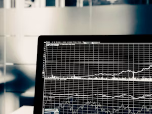Financial data charts on a screen